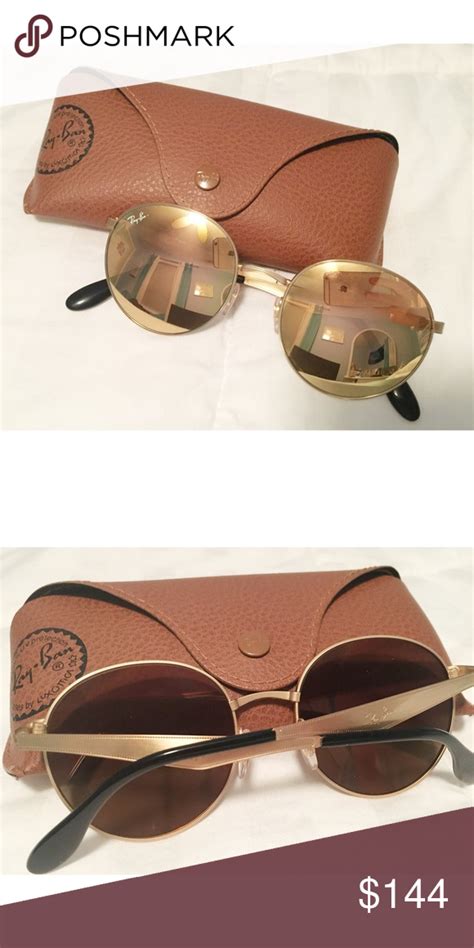 authentic ray ban sunglasses worn.